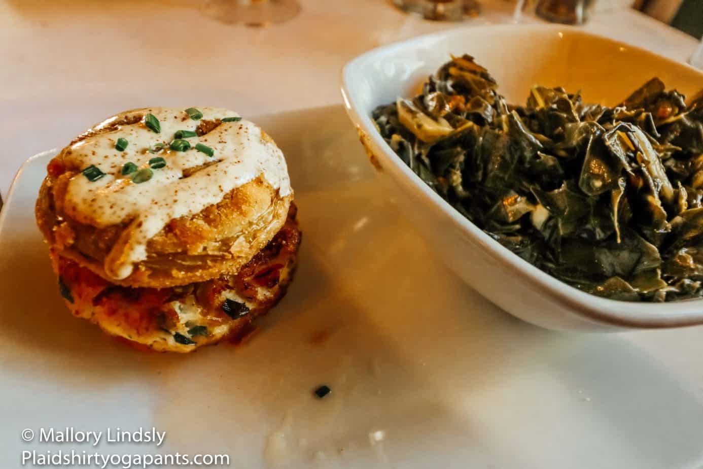 The Olde Pink house lunch size of fried green tomatoes, crab cakes, and collard greens.