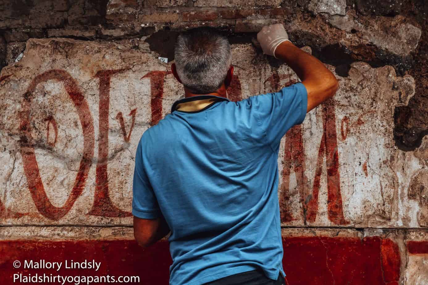 An excavator at Pompeii