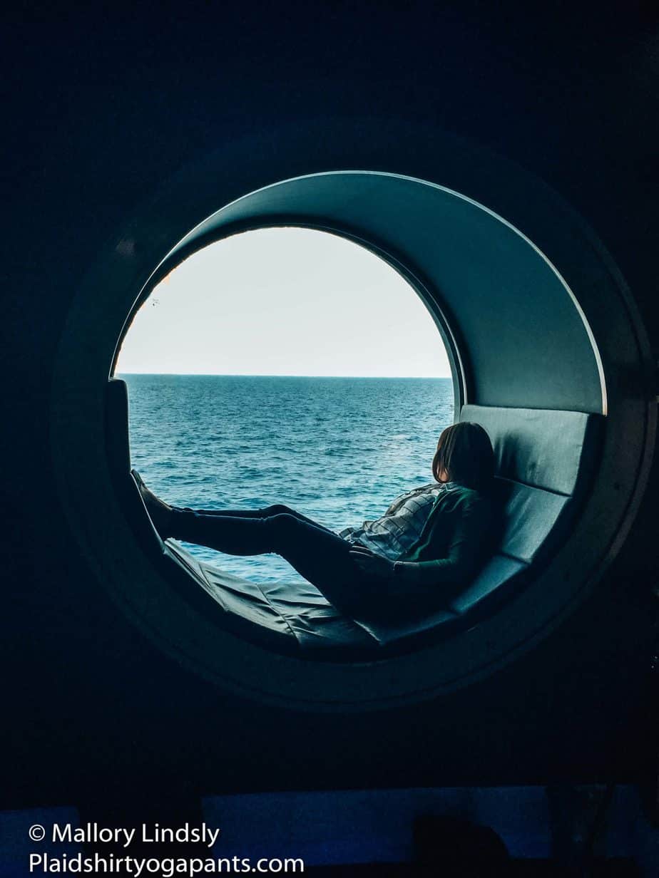 mallory in a port hole on the disney cruise