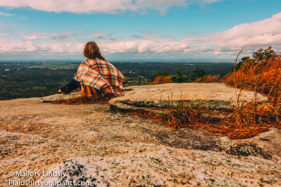 Mallory sitting on Stone Mountain in Atlanta. 