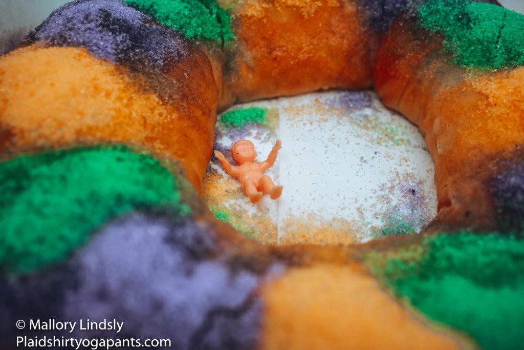 Small plastic baby in a King Cake.