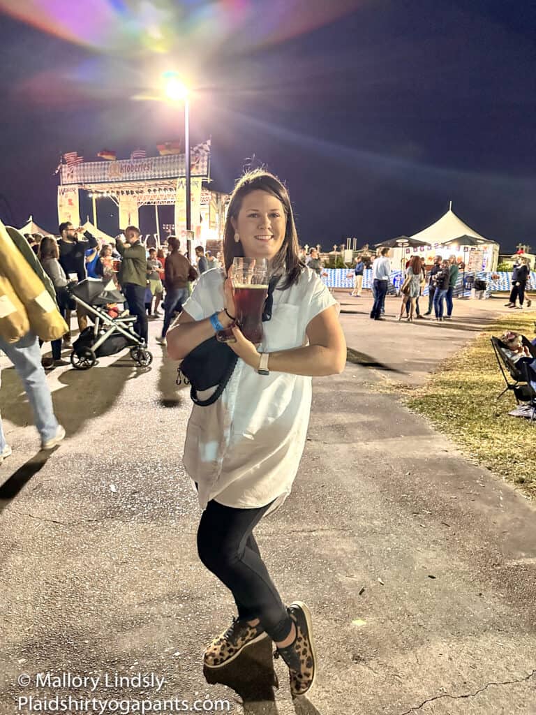 Girl holding a beer at Oktoberfest